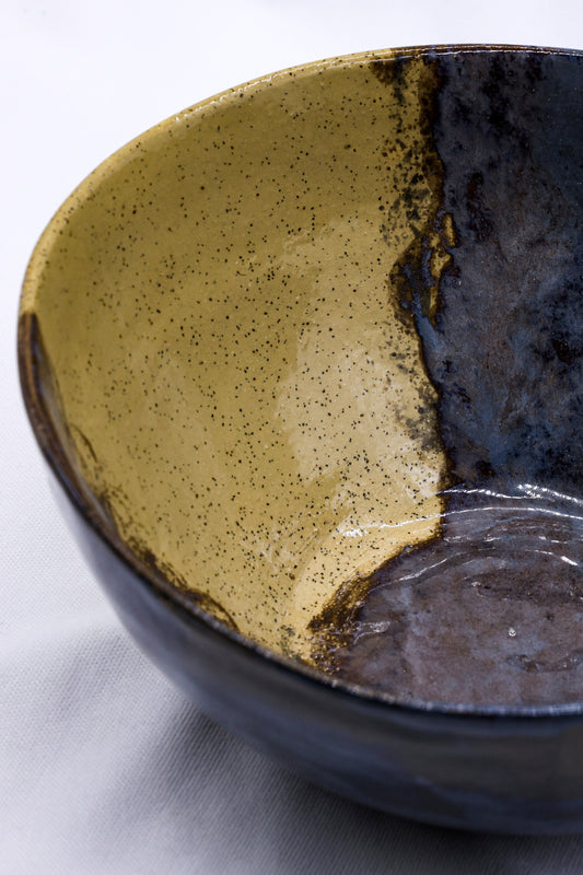 Large indigo clay ceramic dinner bowl by Ribera Handmade Ceramics with a rustic stoneware finish.