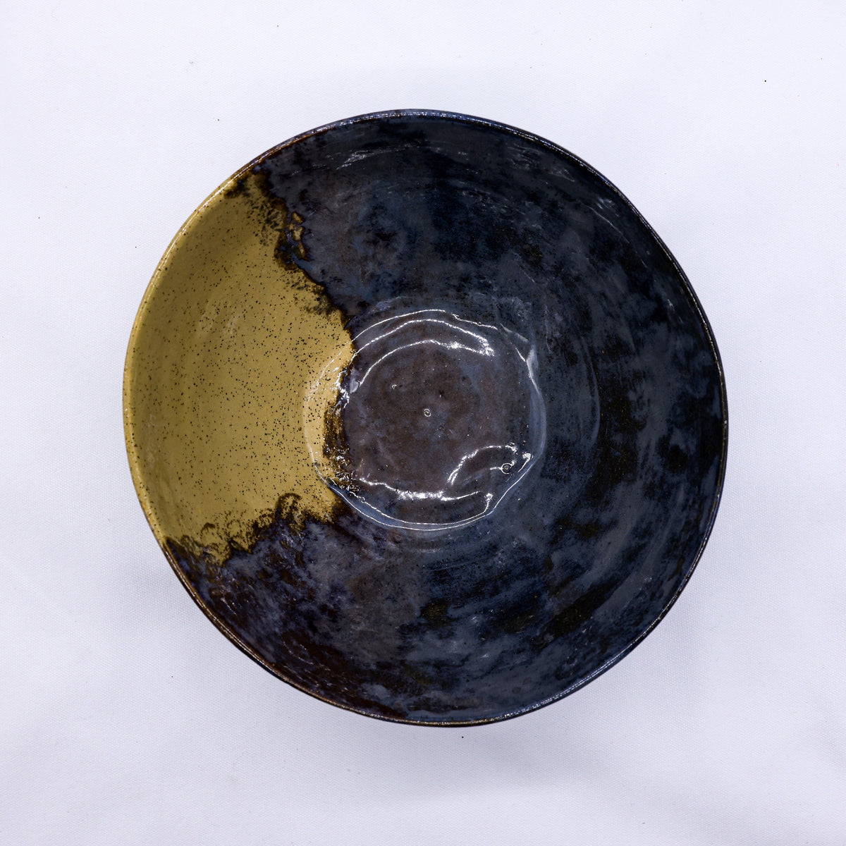 Large indigo clay ceramic dinner bowl by Ribera Handmade Ceramics, featuring a handcrafted stoneware design.