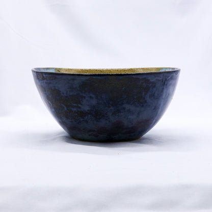 Large Ochre Tide Speckle handmade ceramic stoneware dinner bowl by Ribera Handmade Ceramics, showcasing a speckled ochre and tide design.