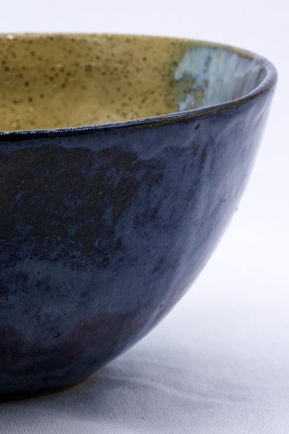 Large ochre tide speckle handmade ceramic stoneware dinner bowl by Ribera Handmade Ceramics, featuring a textured speckled design.