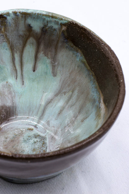 Small blue ceramic dinner bowl with a stone reef design by Ribera Handmade Ceramics, showcasing a handmade stoneware finish.