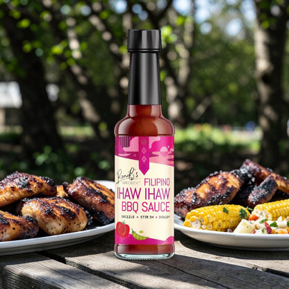 Filipino-style Ihaw Ihaw BBQ sauce by RoniBs Kitchen outdoors with grilled food, showcasing the marinade's rich, flavorful appearance.