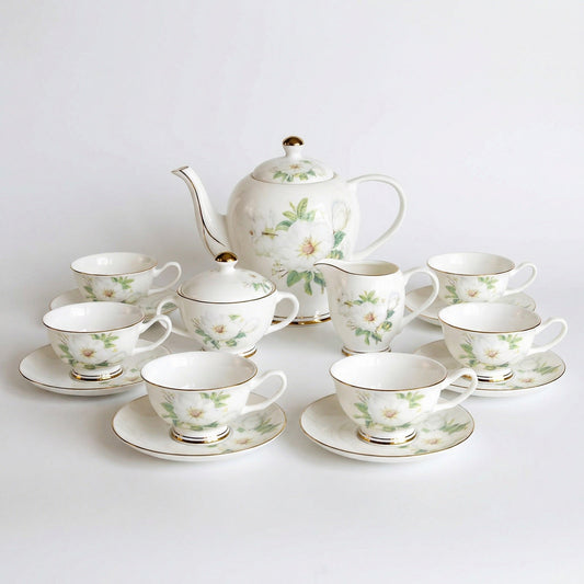 Ivory Camellia tea set by KitchBoom, service for 6 with 15 pieces, featuring elegant fine bone china cups, teapot, and saucers.