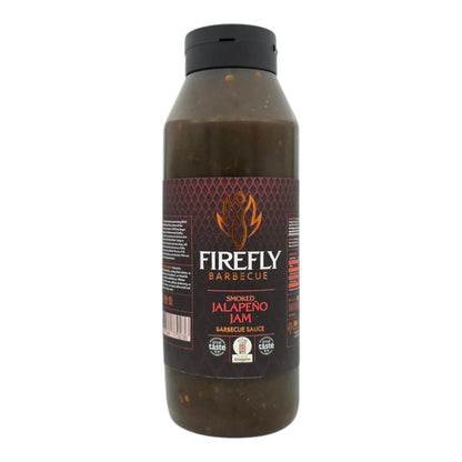 Spicy smoked jalapeño jam in a jar, vibrant green and red peppers visible, perfect for hot sauce and condiment lovers.