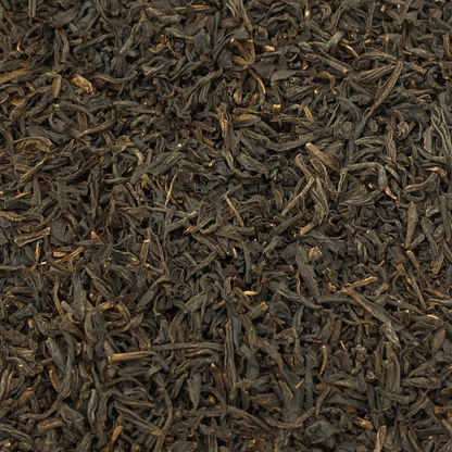 Organic Keemun Panda black tea from Porter Hill Tea Company, showing loose dark tea leaves in a close-up image.