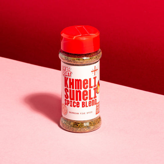 Khmeli-suneli Georgian spice blend in 25g shaker bottle by The GOAT Seasoning Blends, featuring a colorful spice mix.