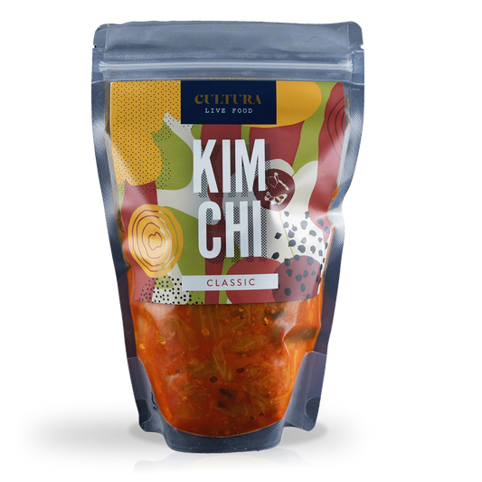 Fermented kimchi in a jar by Cultura Live Food, showing vibrant cabbage and spice-rich ingredients for traditional Korean kimchi