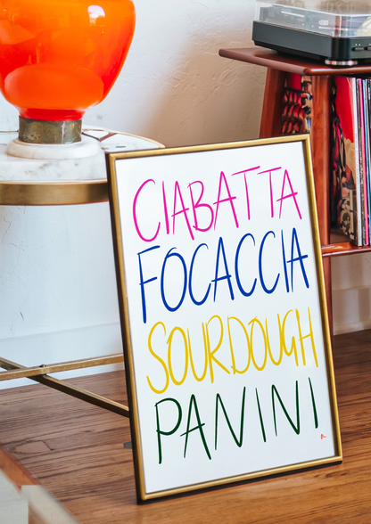 Colorful bold kitchen typographic print featuring bread illustrations, designed for bread lovers by Peak Prints.