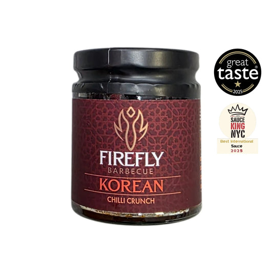Korean Chilli Crunch spicy hot sauce by FireFly Barbecue in a jar with chili flakes and crunchy texture, award-winning condiment.