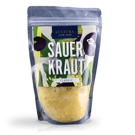 Cultura Live Food sauerkraut in a glass jar, showing fresh, fermented cabbage with a tangy, probiotic-rich appearance.