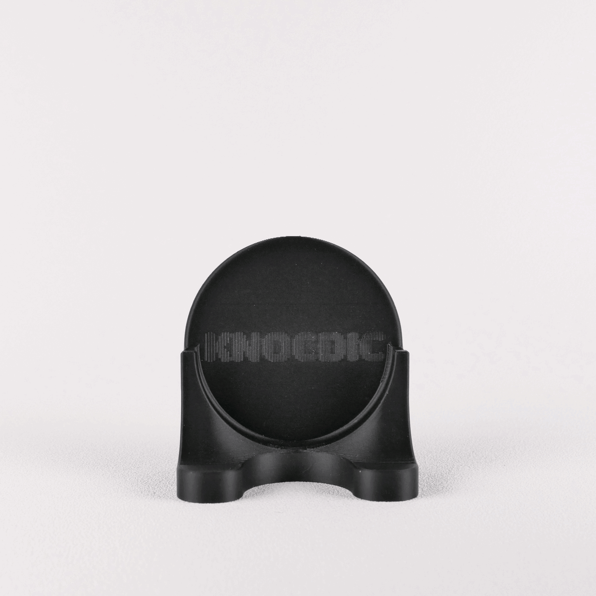 KNOCDIC® magnetic universal portafilter holder for 51/54/58mm espresso portafilters, shown holding a portafilter on a countertop.