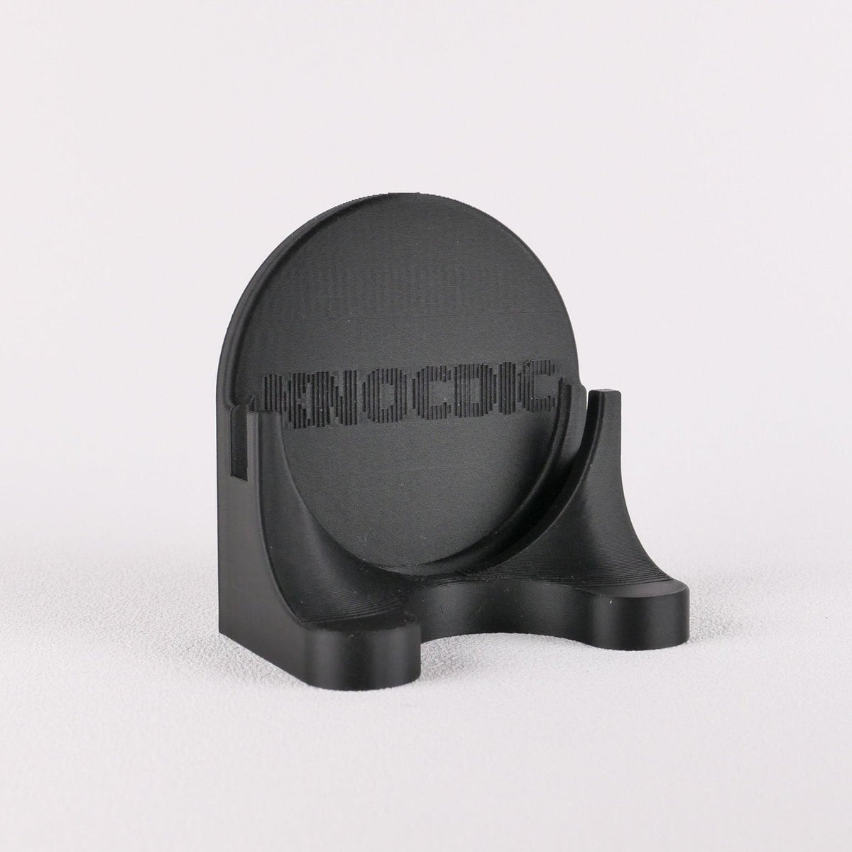 KNOCDIC® magnetic universal portafilter holder for 51mm, 54mm, and 58mm portafilters, shown holding a coffee portafilter.