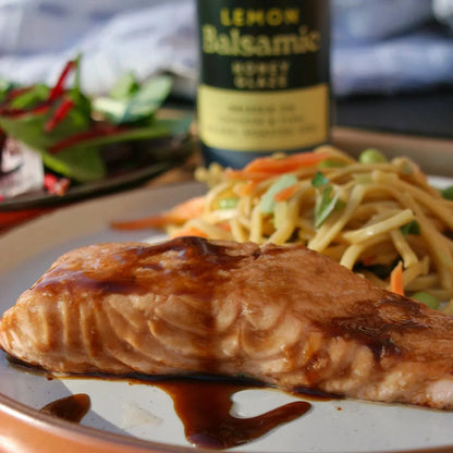 Lemon Balsamic Honey Glaze by Hot Star Honey, showcasing a glossy, golden-brown balsamic glaze with lemon flavor hints.