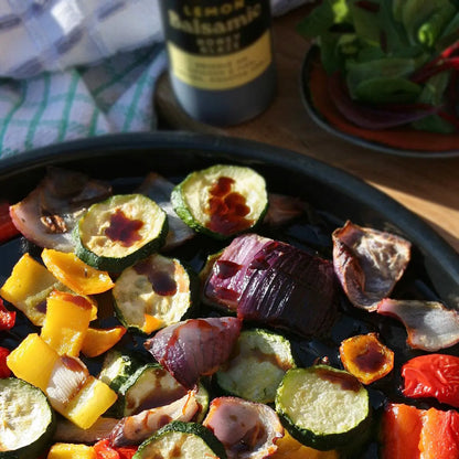 Lemon Balsamic Honey Glaze by Hot Star Honey, a rich balsamic glaze with lemon and honey for drizzling or finishing dishes.