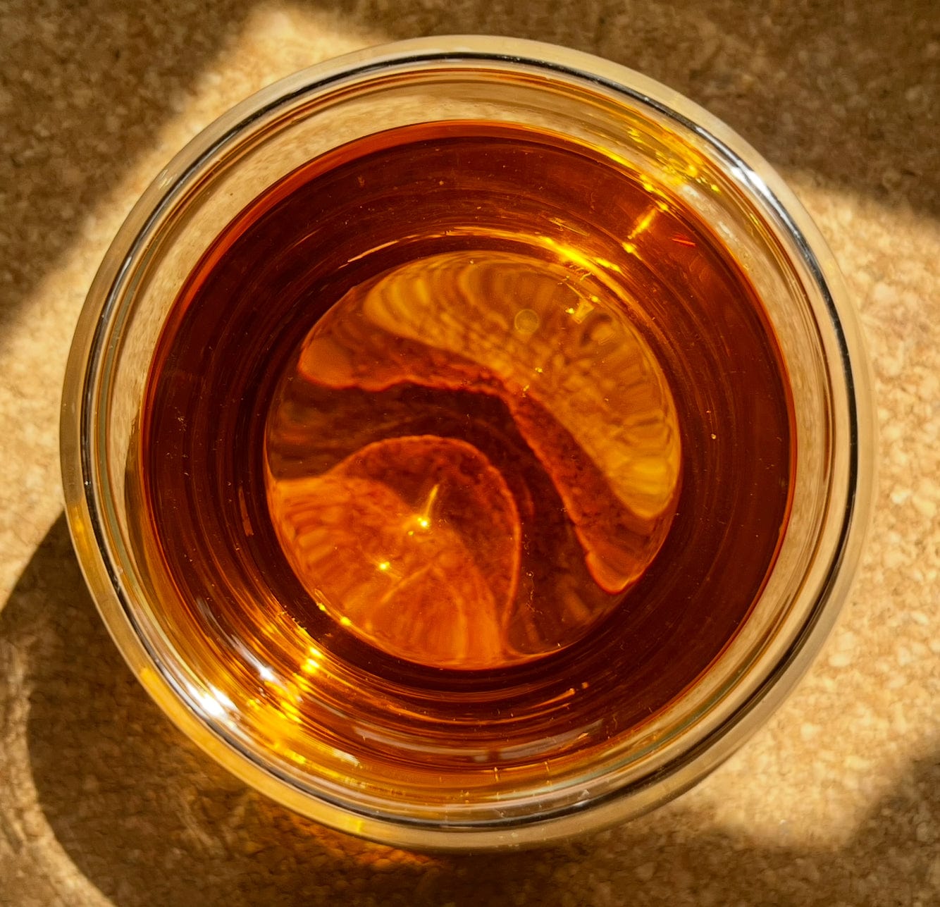 Loose leaf English Breakfast black tea from Porter Hill Tea Company, showcasing dark, aromatic tea leaves in a natural setting.