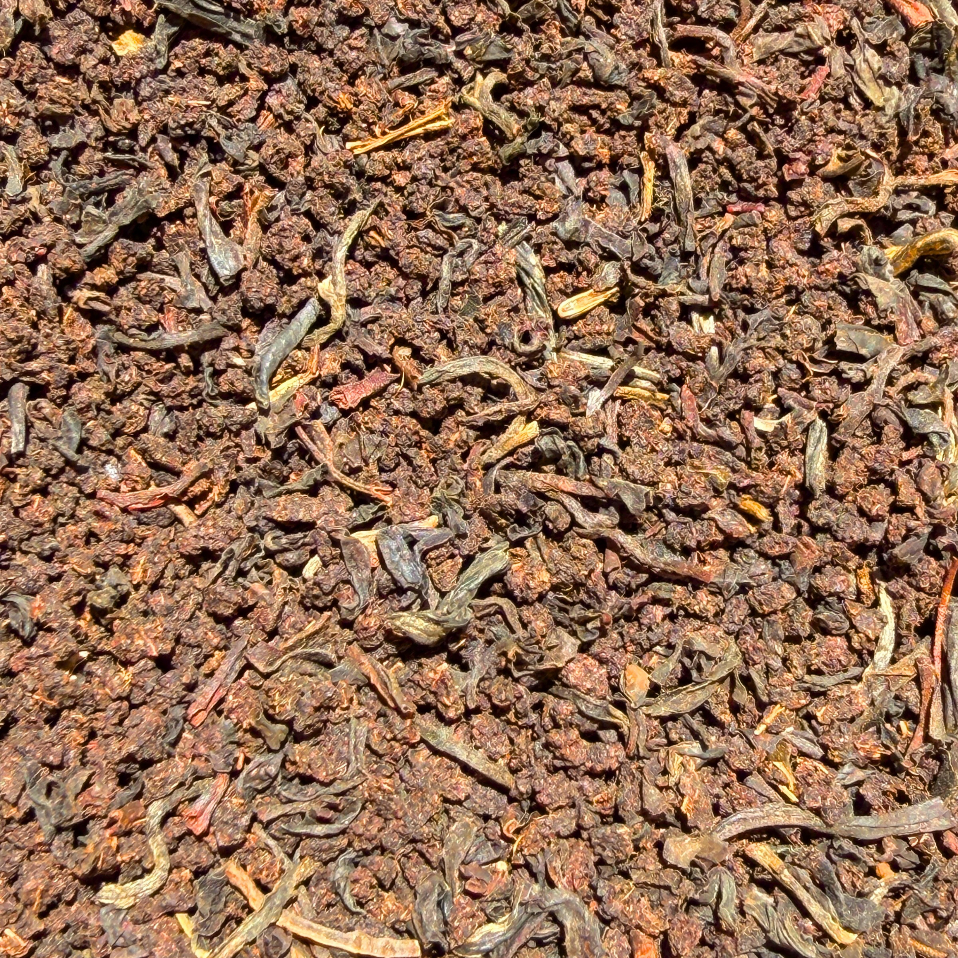 Loose leaf English Breakfast black tea from Porter Hill Tea Company, showing a close-up of dark, rich tea leaves.