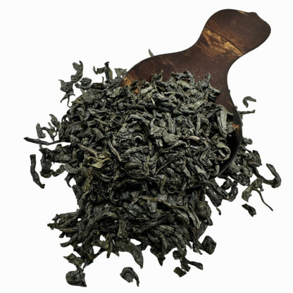 Porter Hill Tea Company Lucky Dragon Hyson green tea leaves in a traditional tea package.