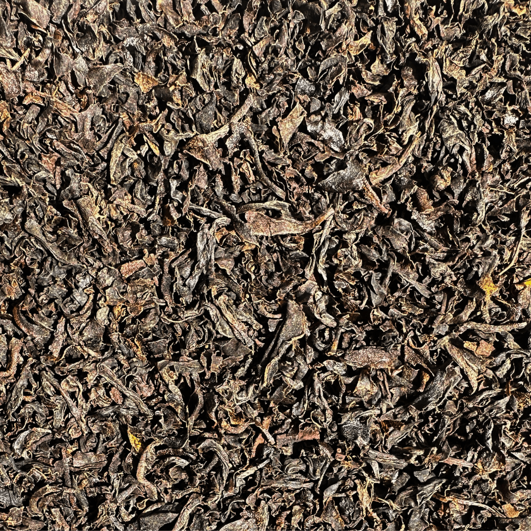Loose Ceylon Orange Pekoe black tea leaves from Porter Hill Tea Company, showcasing rich, dark tea leaves in a natural arrangement.
