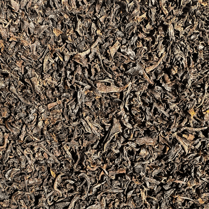 Loose Ceylon Orange Pekoe black tea leaves from Porter Hill Tea Company, showcasing rich, dark tea leaves in a natural arrangement.