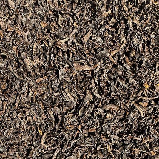 Loose Ceylon Orange Pekoe black tea leaves from Porter Hill Tea Company, showcasing rich, dark tea leaves in a natural arrangement.