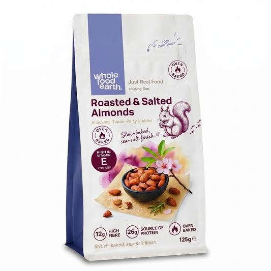 Whole Food Earth roasted and salted almonds in a bowl, showcasing crunchy baked nuts with salt seasoning.