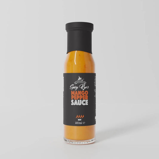 Spicy Ryes Mango Pepper Hot Sauce bottle with vibrant label, showcasing fresh mango and chili peppers on a wooden surface.