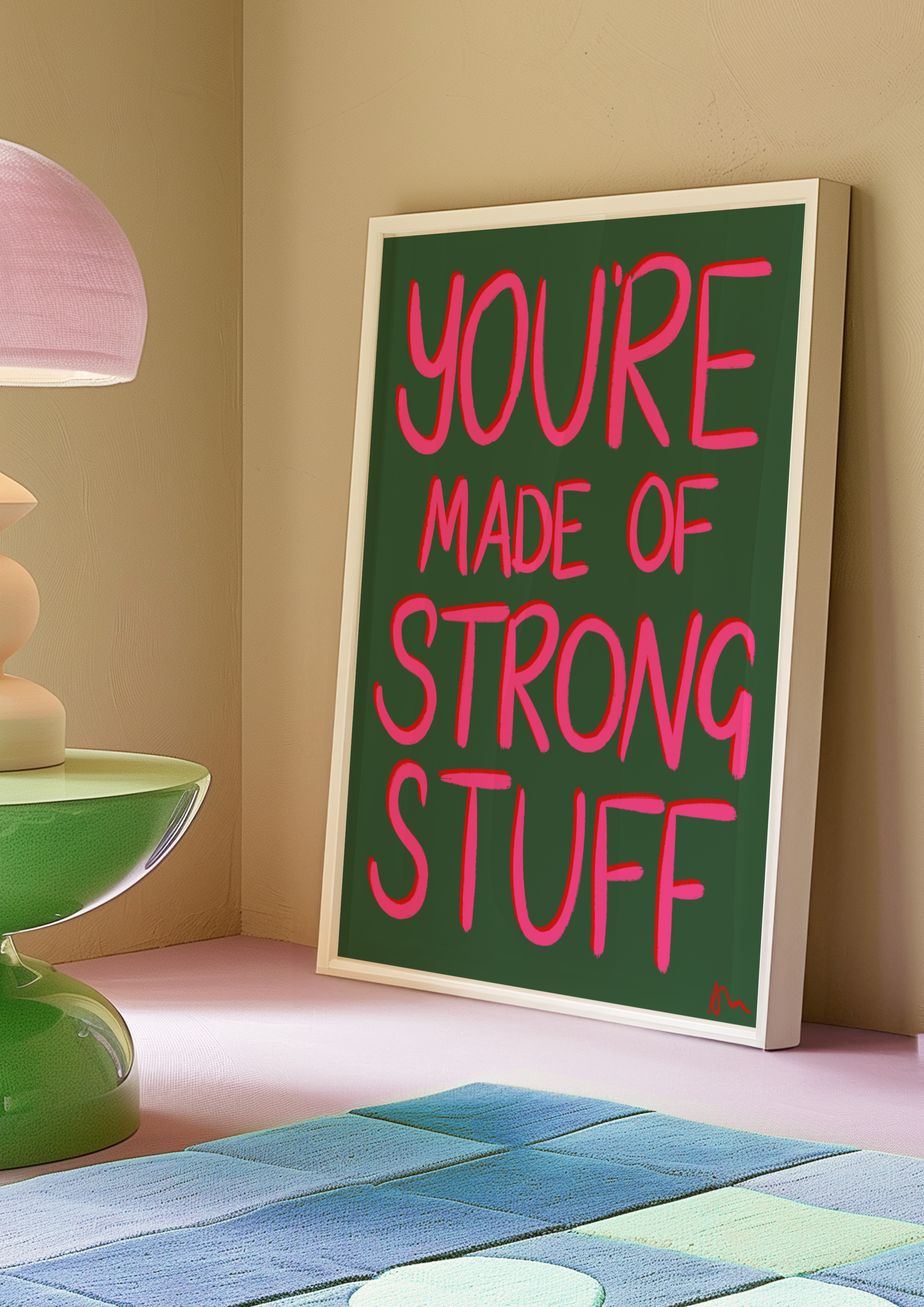 Inspirational green and pink poster with positive quote "You’re Made of Strong Stuff" by Peak Prints, featuring vibrant, uplifting design.