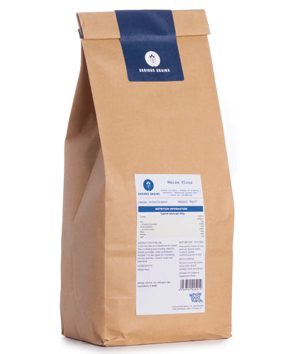 Whole Food Earth maize flour in a 1kg bag, showing bright yellow maize grains, part of Serious Grains flours and grains collection.