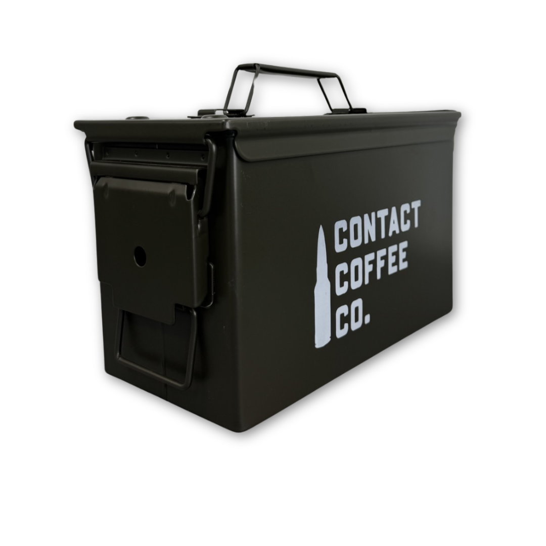 Contact Coffee Company Ltd. metal coffee ammo box gear, rugged metal tin with military-inspired design for storing coffee or accessories.