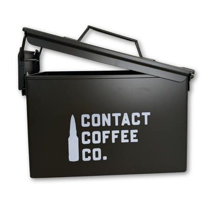 Metal coffee ammo tin from Contact Coffee Company Ltd., rugged gear storage container with vintage military style.