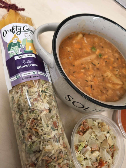 Crafty Cook Easy Meals Starter Plan featuring a bowl of hearty minestrone soup with vegetables and pasta, ready to serve.