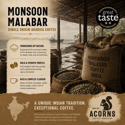 Medium roast Monsooned Malabar coffee beans from Acorns Coffee & Cake, showcasing the unique, large, light brown beans.