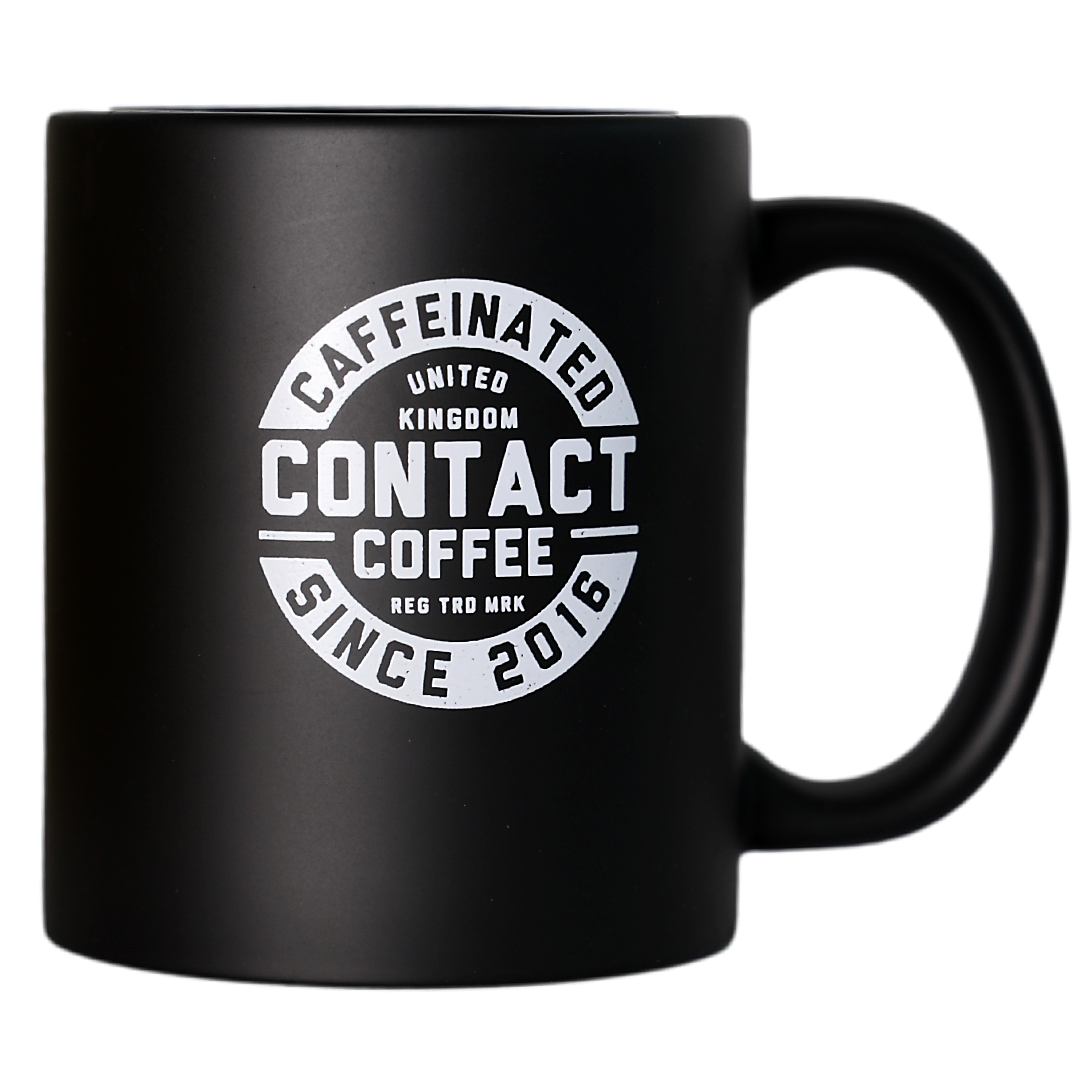 Contact Coffee Co mug featuring the Bravo Gear logo, a ceramic coffee mug with a modern design and bold branding.