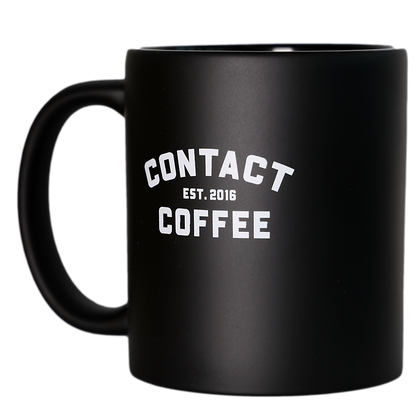 Contact Coffee Co mug featuring the Charlie gear logo, a stylish ceramic coffee cup with a modern design and printed branding.