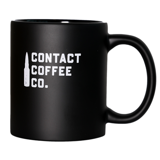 Contact Coffee Co Mug Alpha, a ceramic gear-shaped coffee mug with the Contact Coffee Company Ltd. logo and design visible.