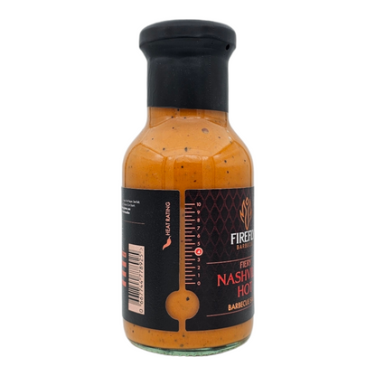 FireFly Barbecue Nashville Hot BBQ Sauce bottle with label and side view, showcasing the spicy, vibrant sauce for grilling or dipping.
