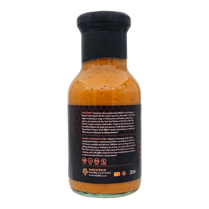 FireFly Barbecue Nashville Hot Sauce bottle, side view showing label and vibrant orange-red color of the BBQ sauce.