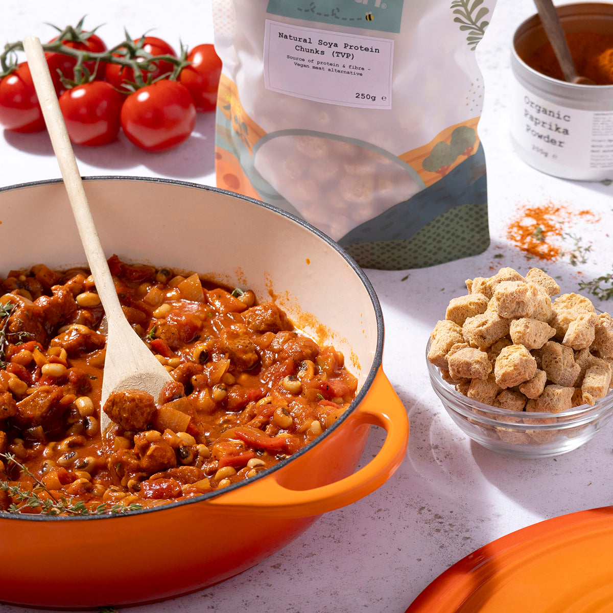 Whole Food Earth TVP natural soy protein chunks in a bowl, showcasing the beans and pulses product for plant-based cooking.