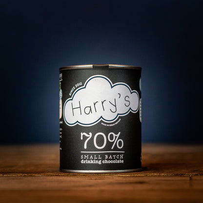 A cup of Harry's Hot Chocolate with creamy 70% hot chocolate in a mug, steam rising, perfect for cozy winter moments.