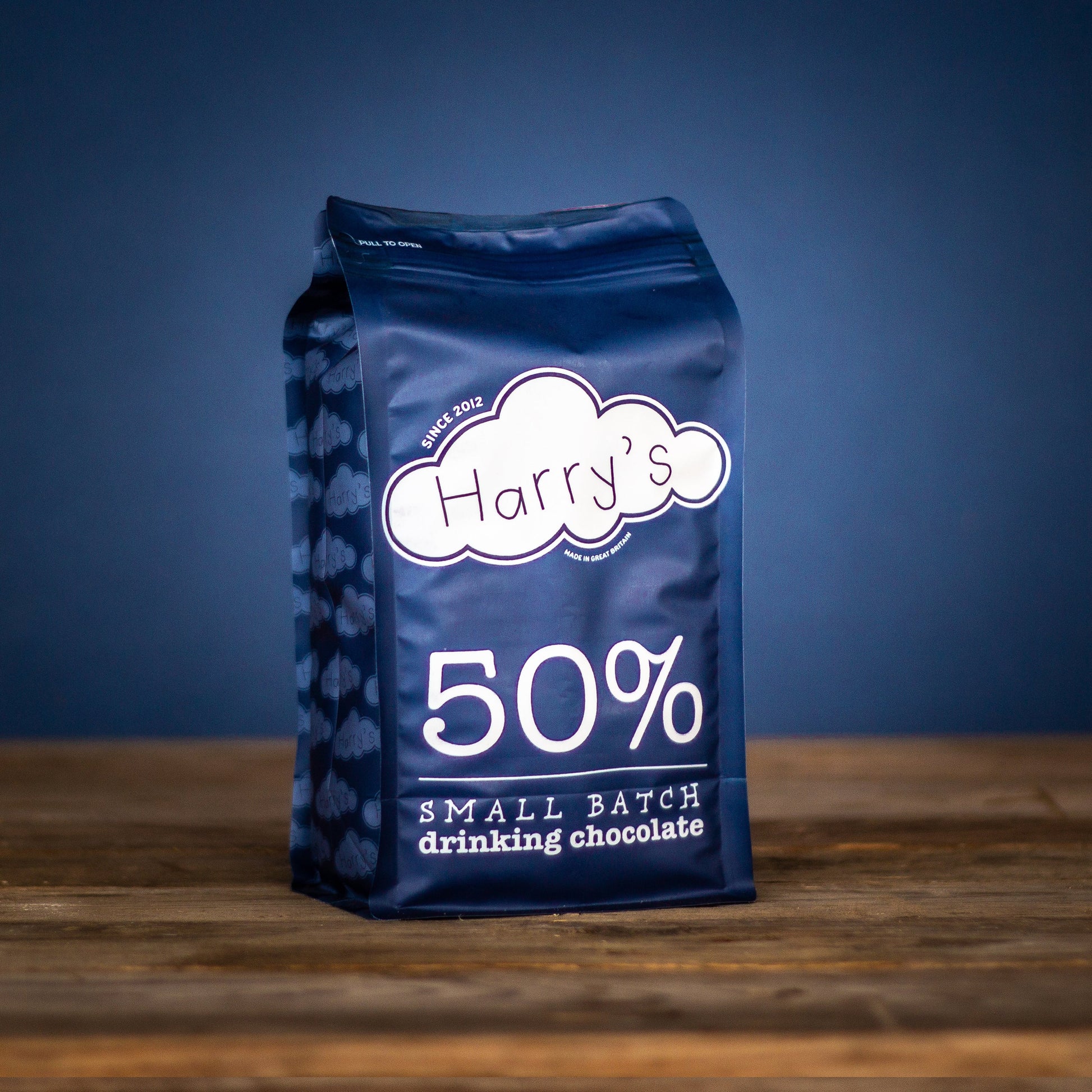 Bag of Harry's Hot Chocolate with 50% hot chocolate mix, showing a resealable bag labeled "New" and 1.6kg weight.