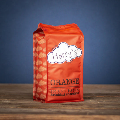 Harry's Hot Chocolate orange 44% hot chocolate in a 1.6kg bag, rich and creamy cocoa powder for delicious drinks.