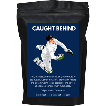 Bag of Caught Behind coffee from Clubhouse Roastery featuring the branded packaging for this specialty coffee blend.