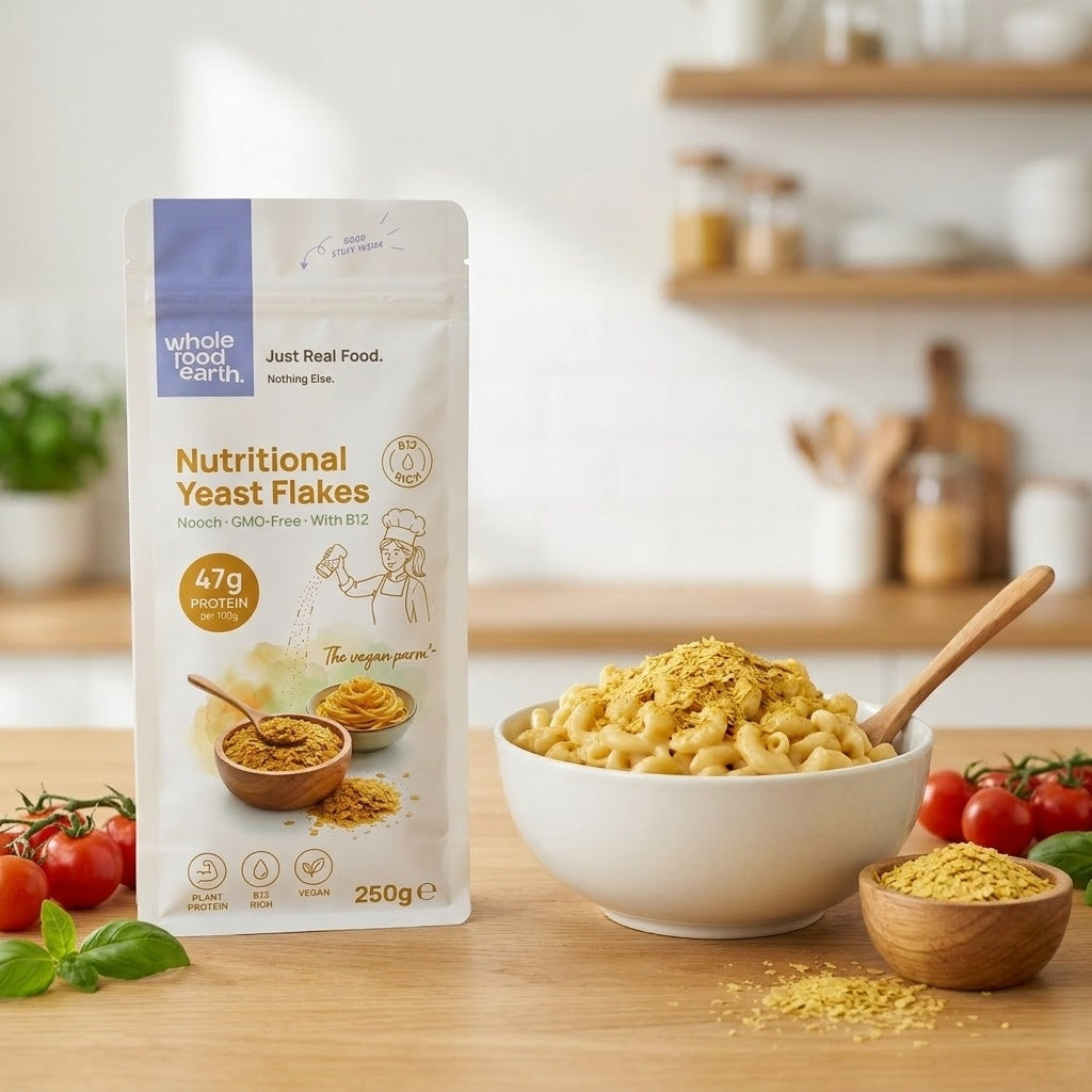 Whole Food Earth nutritional yeast flakes with B12, a vegan-friendly supplement rich in nutrients, displayed in a 250g package.
