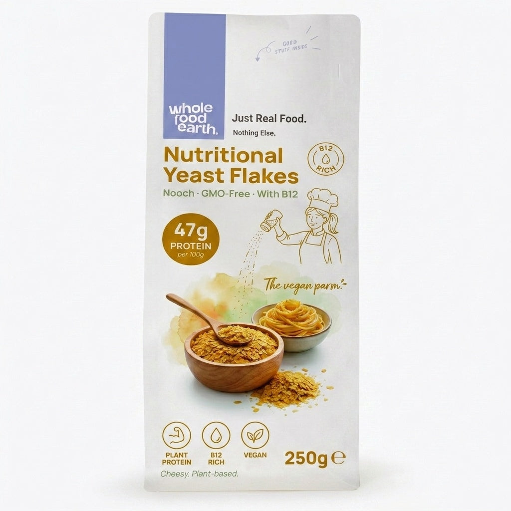 Whole Food Earth nutritional yeast flakes with B12 in a 250g pouch, featuring yellow flakes and nutty flavor for savory dishes.