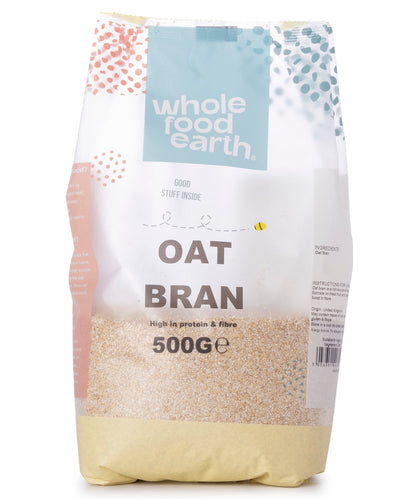 Whole Food Earth oat bran cereal in a 500g package, close-up of the oat bran grains ready for breakfast or baking.