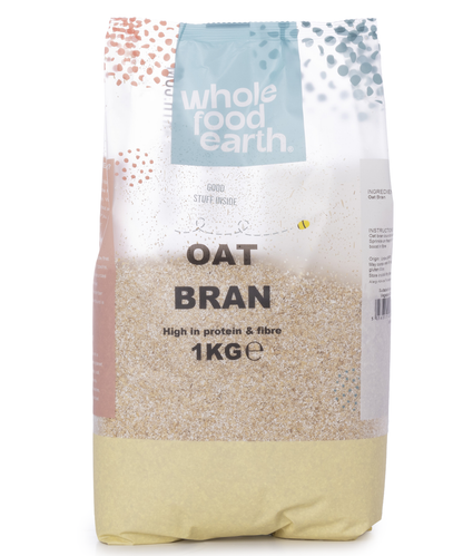 Whole Food Earth oat bran cereal in a 1kg package, showing the dry oat bran with textured flakes and natural appearance.