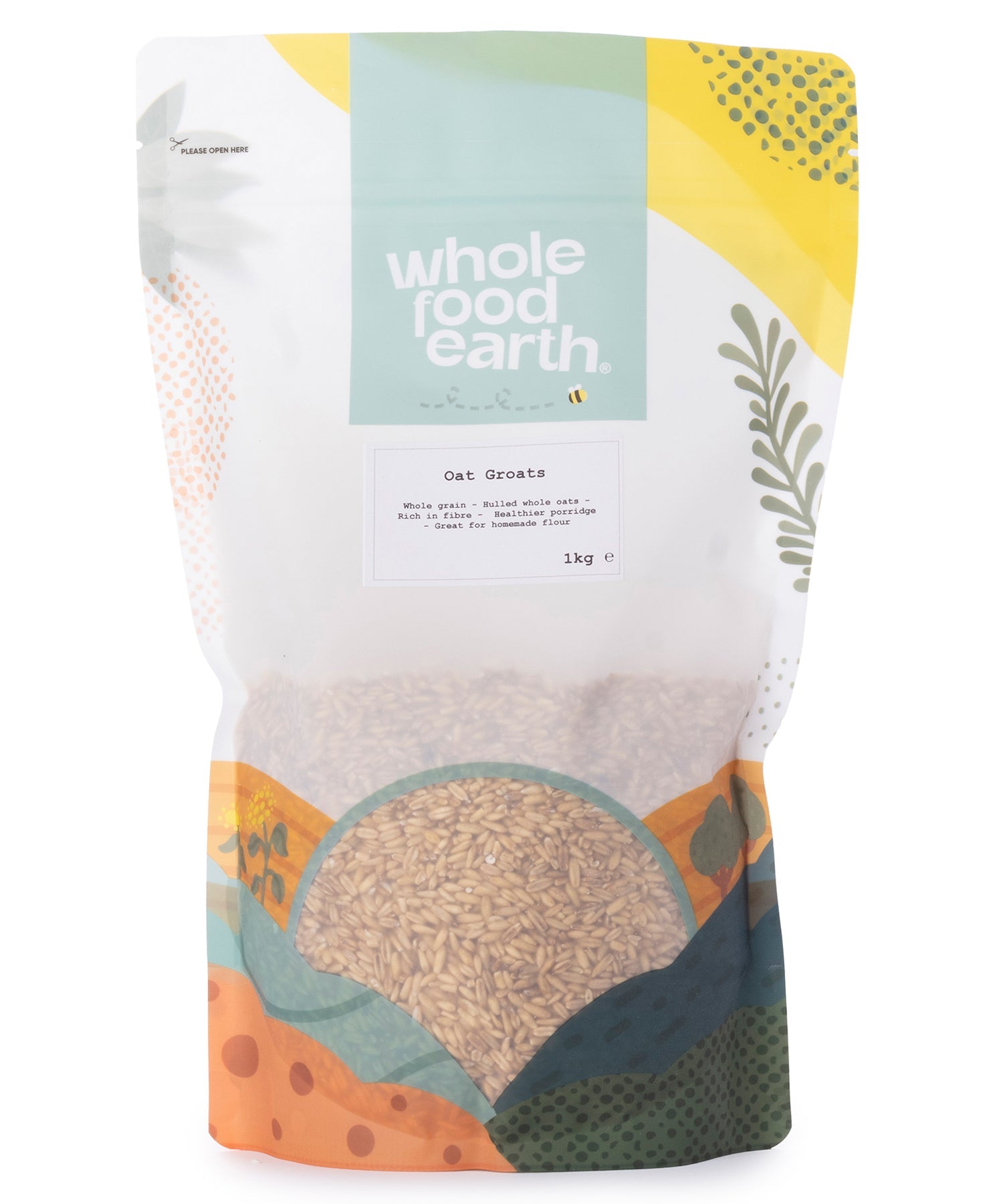 Whole Food Earth oat groats in a clear 1kg package, showing the whole, unprocessed oat grains ready for cooking or baking.