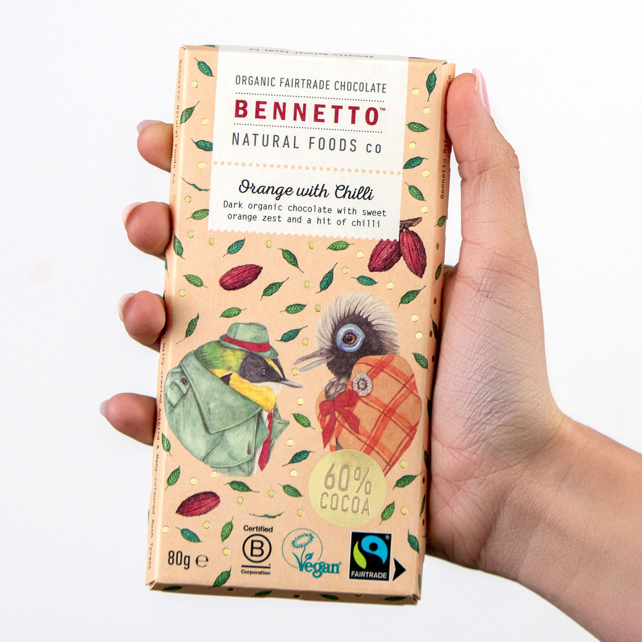 Bennetto Natural Foods UK orange chocolate bar with visible orange segments and chili flakes on the surface.