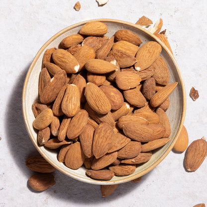 Whole Food Earth organic whole almonds, crunchy and natural nuts and seeds in a close-up image.
