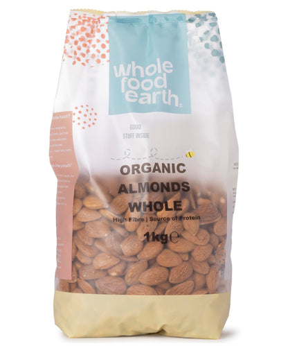Whole Food Earth organic whole almonds in a 1kg bag, showing plump, light brown almonds with a natural shell appearance.